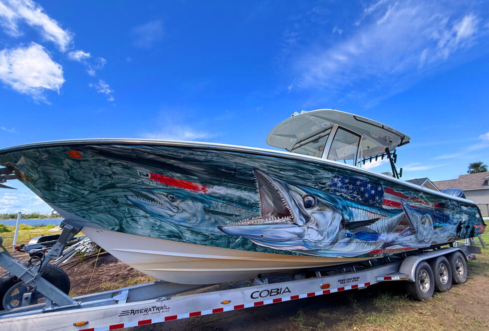 Custom wrapped wakeboard boat at the dock