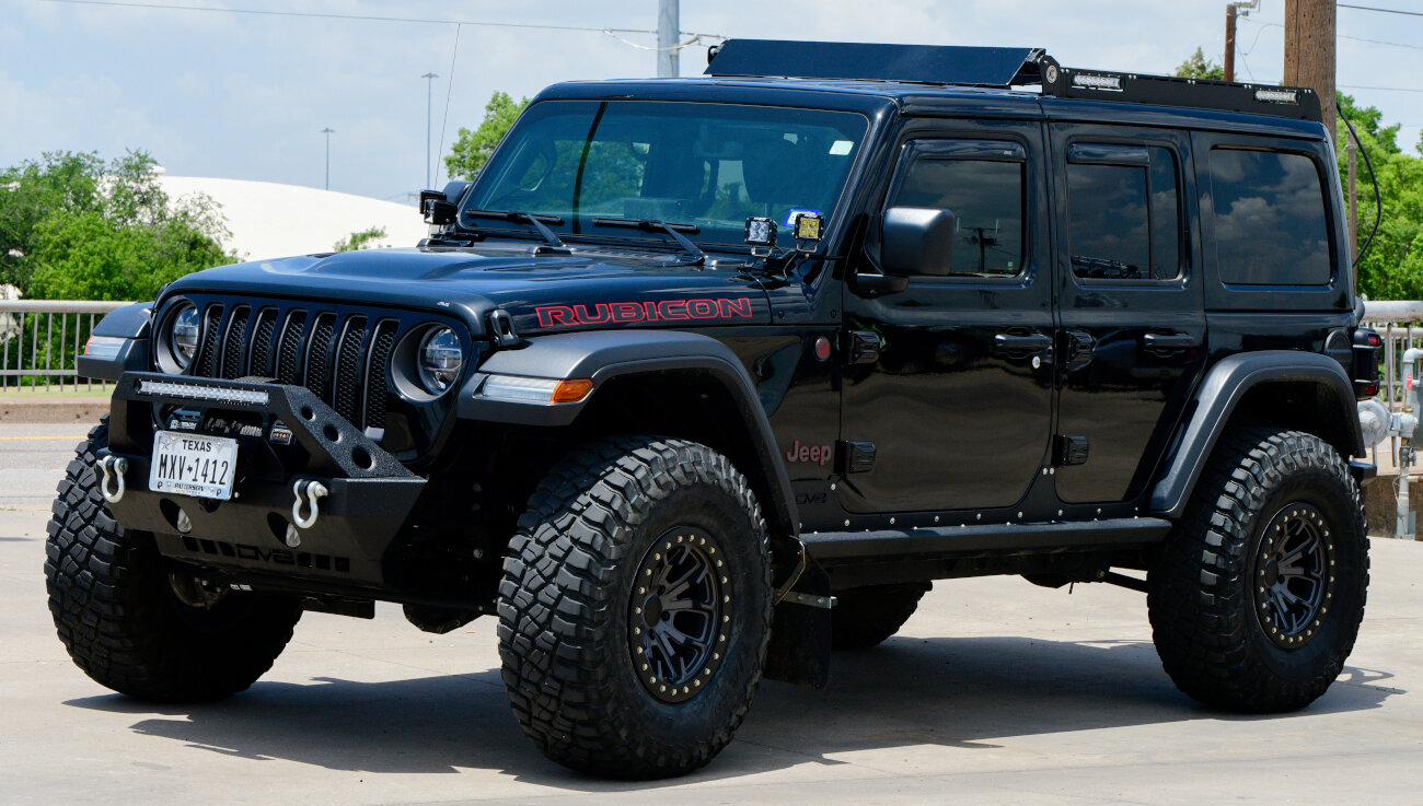 A clean personal pickup truck being hand washed